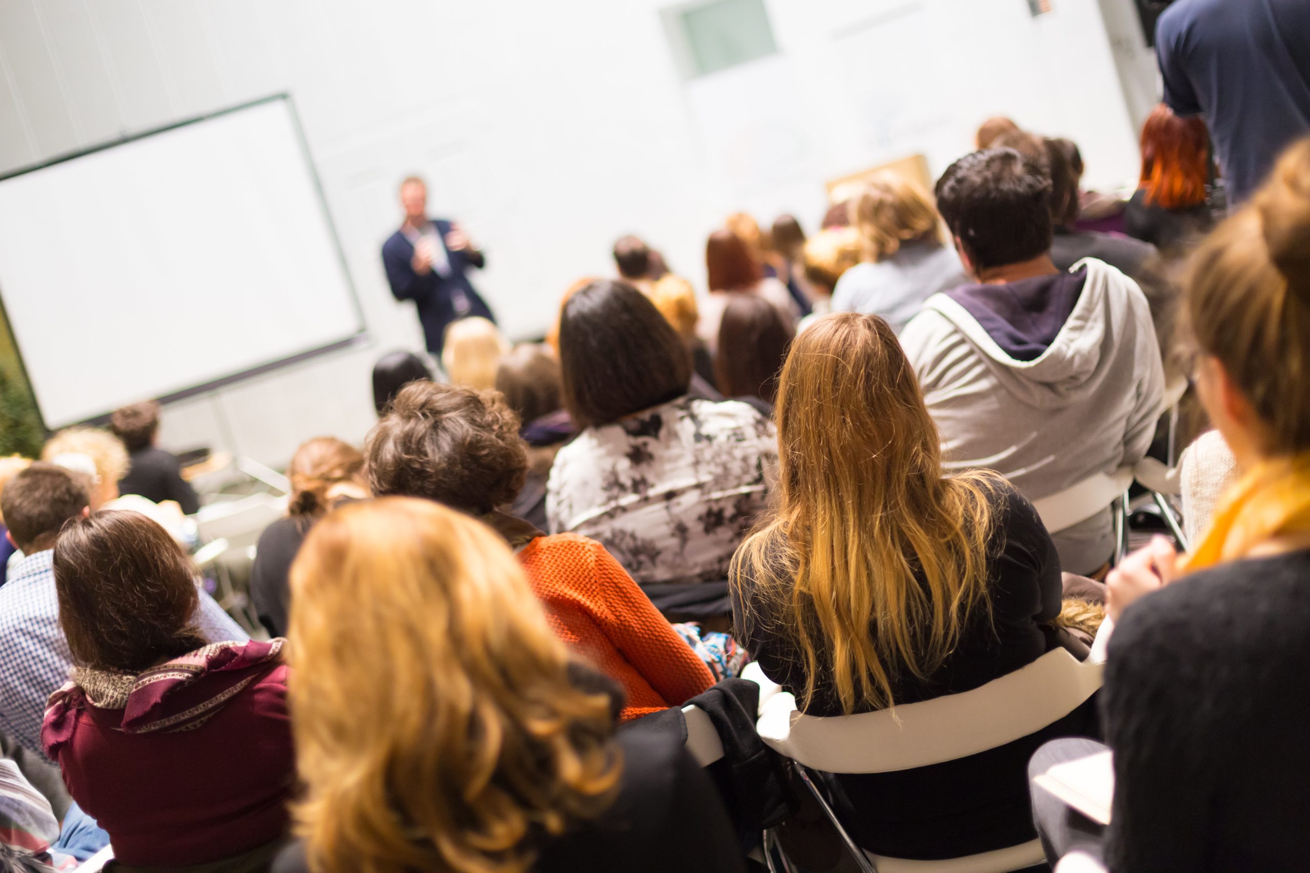 Audience listening to a lecture